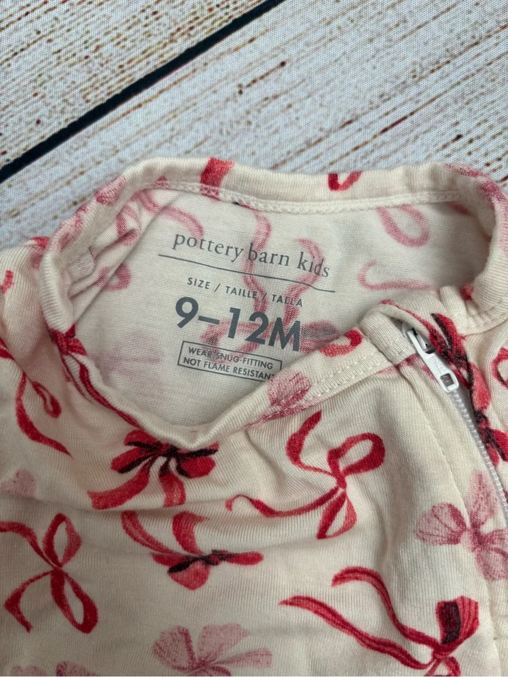 Pottery Barn Kids Long-Sleeve Footed One-Piece with Red Bow Print